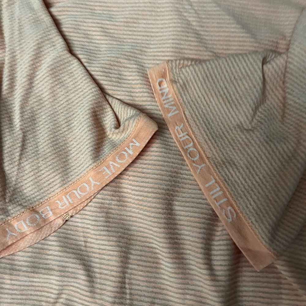 Lululemon orange shirt. Size 8-10. Motivational on the inside of the sleeves. - Picture 3 of 4